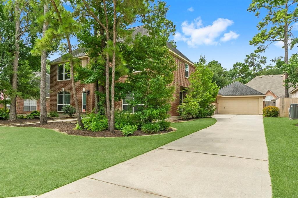 Property Photo: 23 Sparklewood Place TX 77381