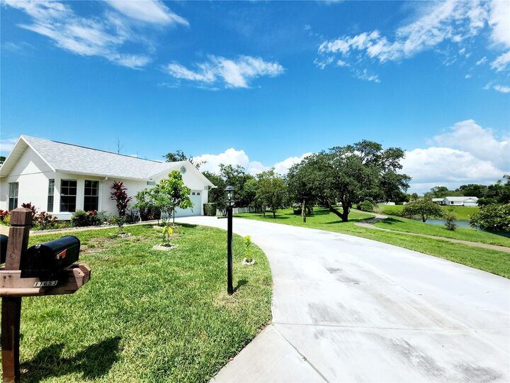 Property Photo:  11653 Orleans Lane  FL 34668 