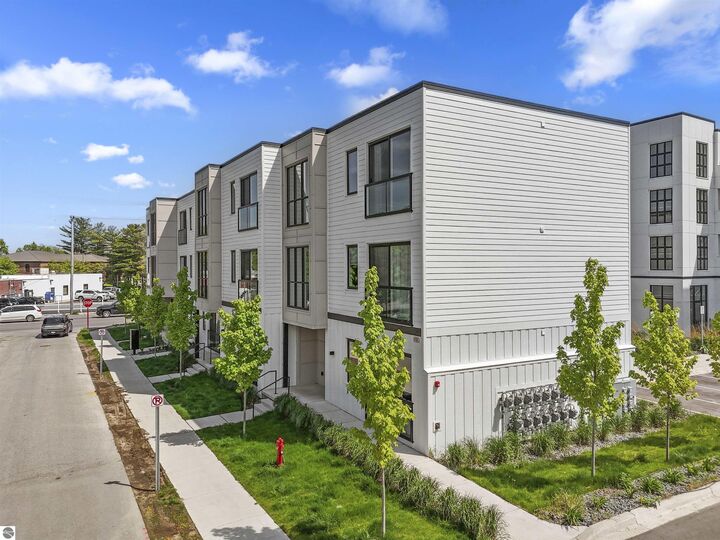 Property Photo:  705 Cypress Street 207  MI 49684 