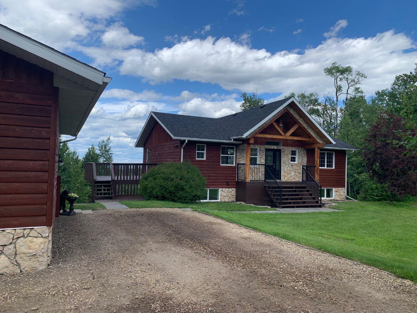 Property Photo: 592056 Range Road 121 16 AB T7S 1P2