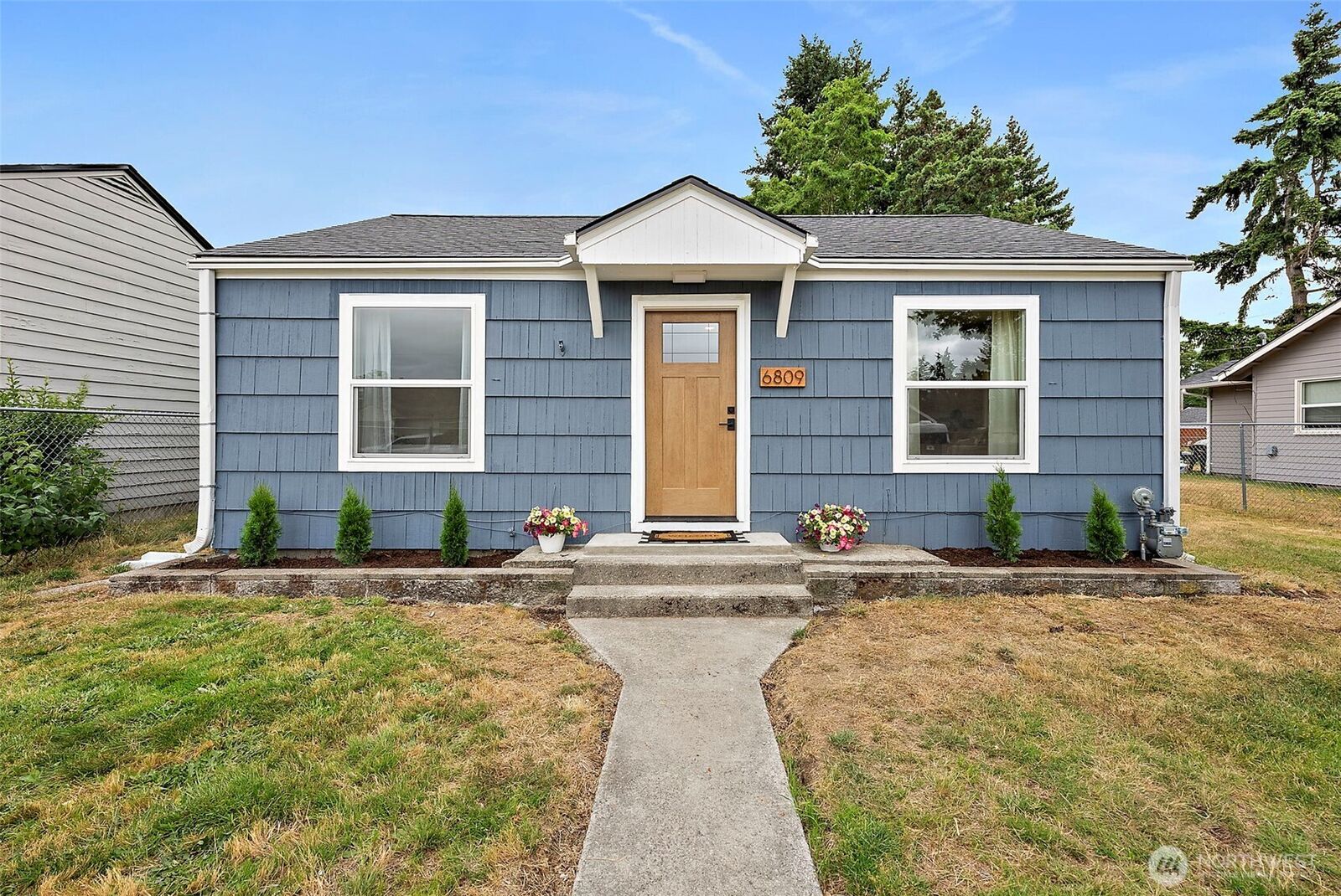 Property Photo: 6809 S Huson Street WA 98409