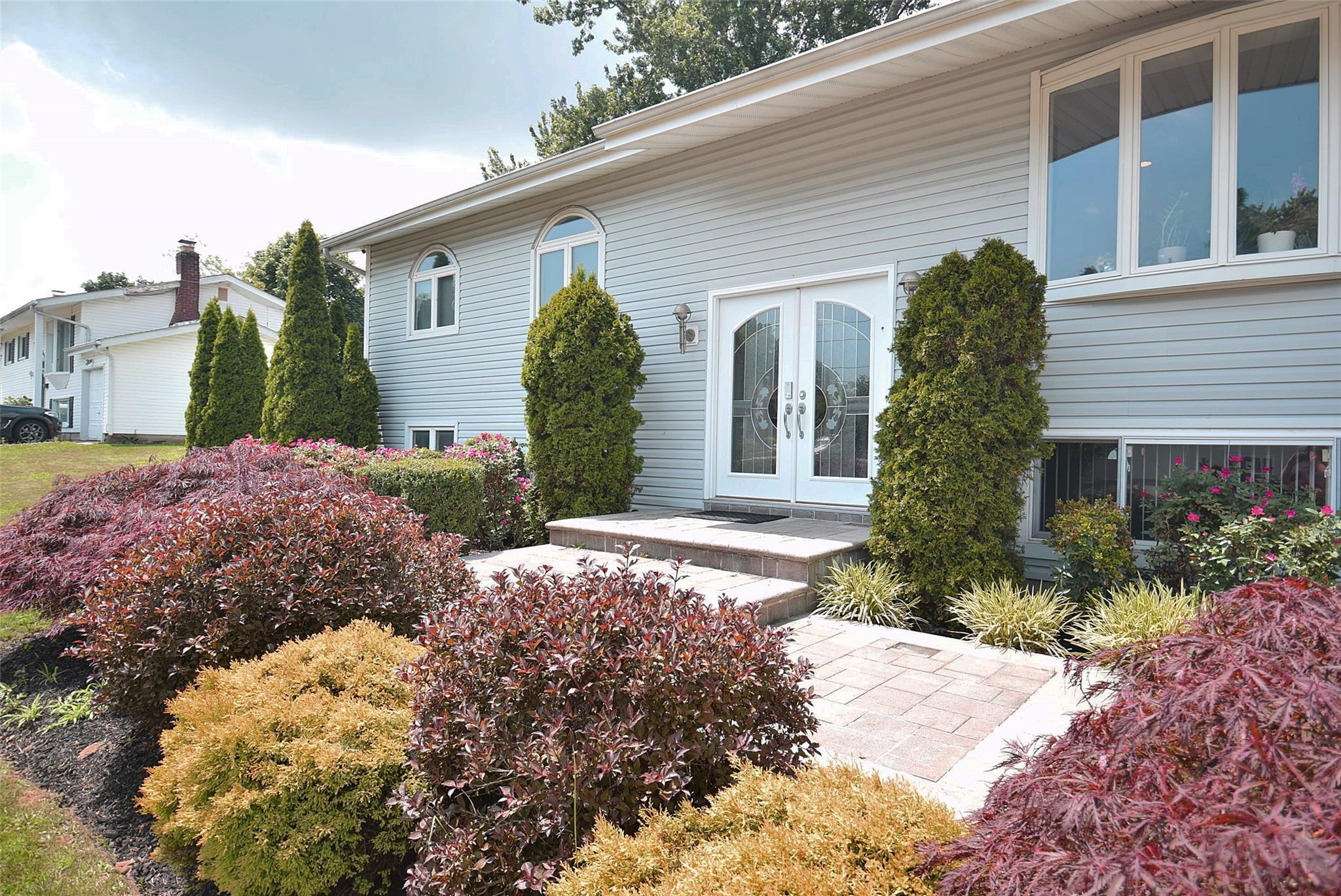 Property Photo: 8 Brookwood Drive NY 11798