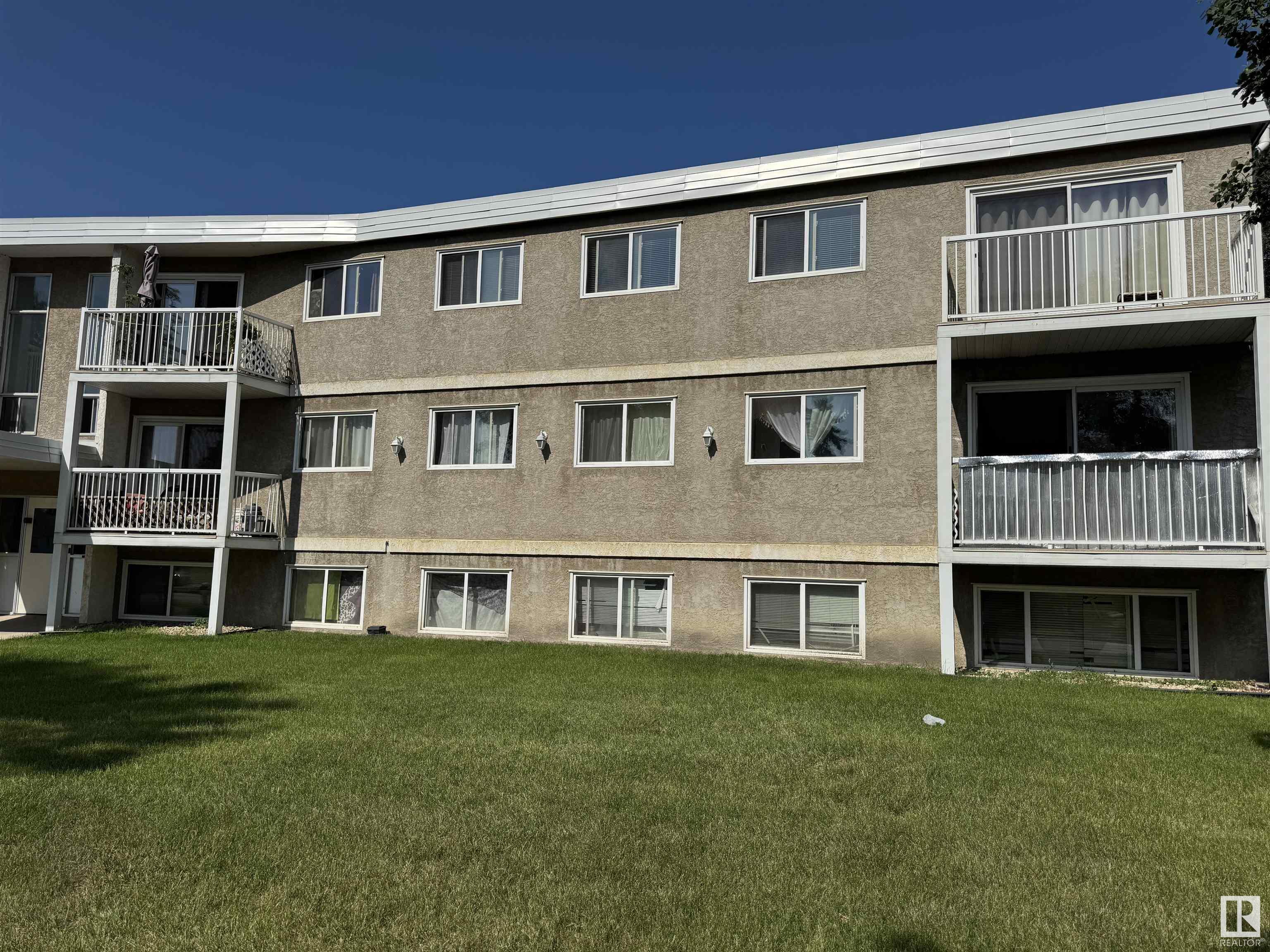 Property Photo: 8930 149 Street NW 207 AB T5R 1B8