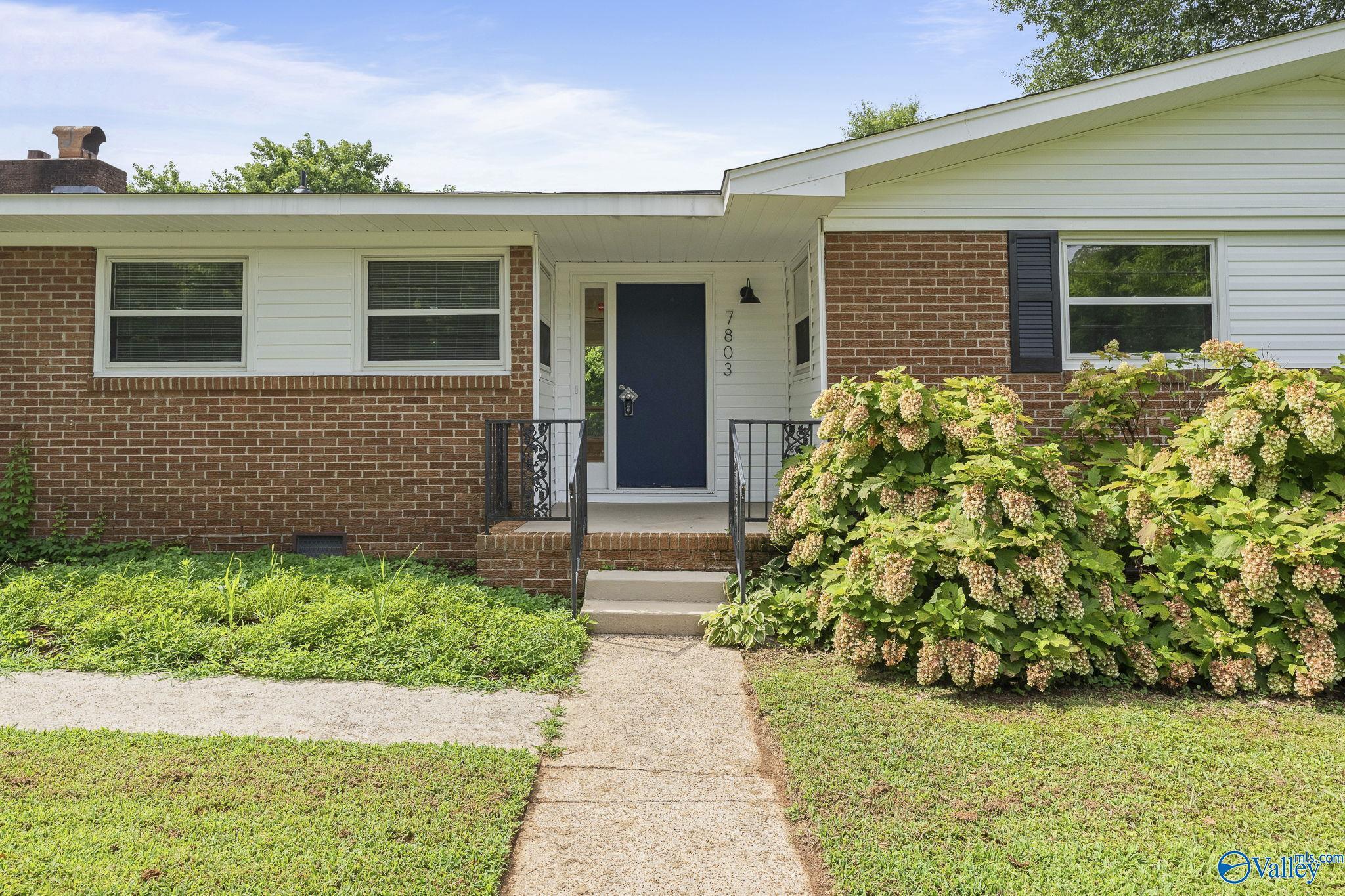Property Photo: 7803 Logan Drive SW AL 35802