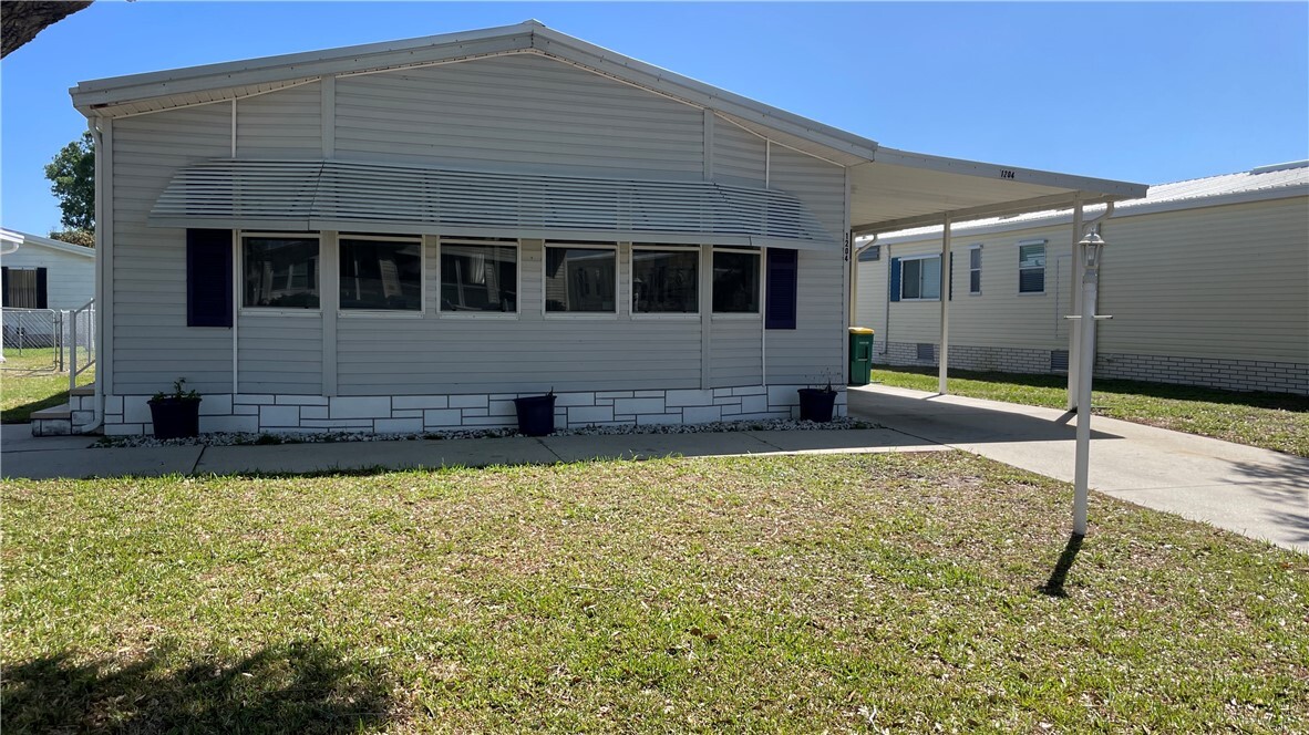 Property Photo: 1204 Calusa Drive FL 32976