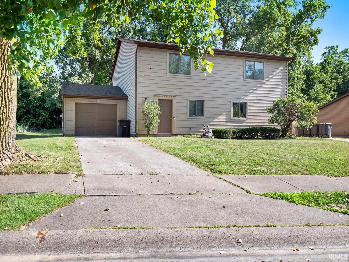 Property Photo: 2310-2312 Versailles Village Place IN 46808