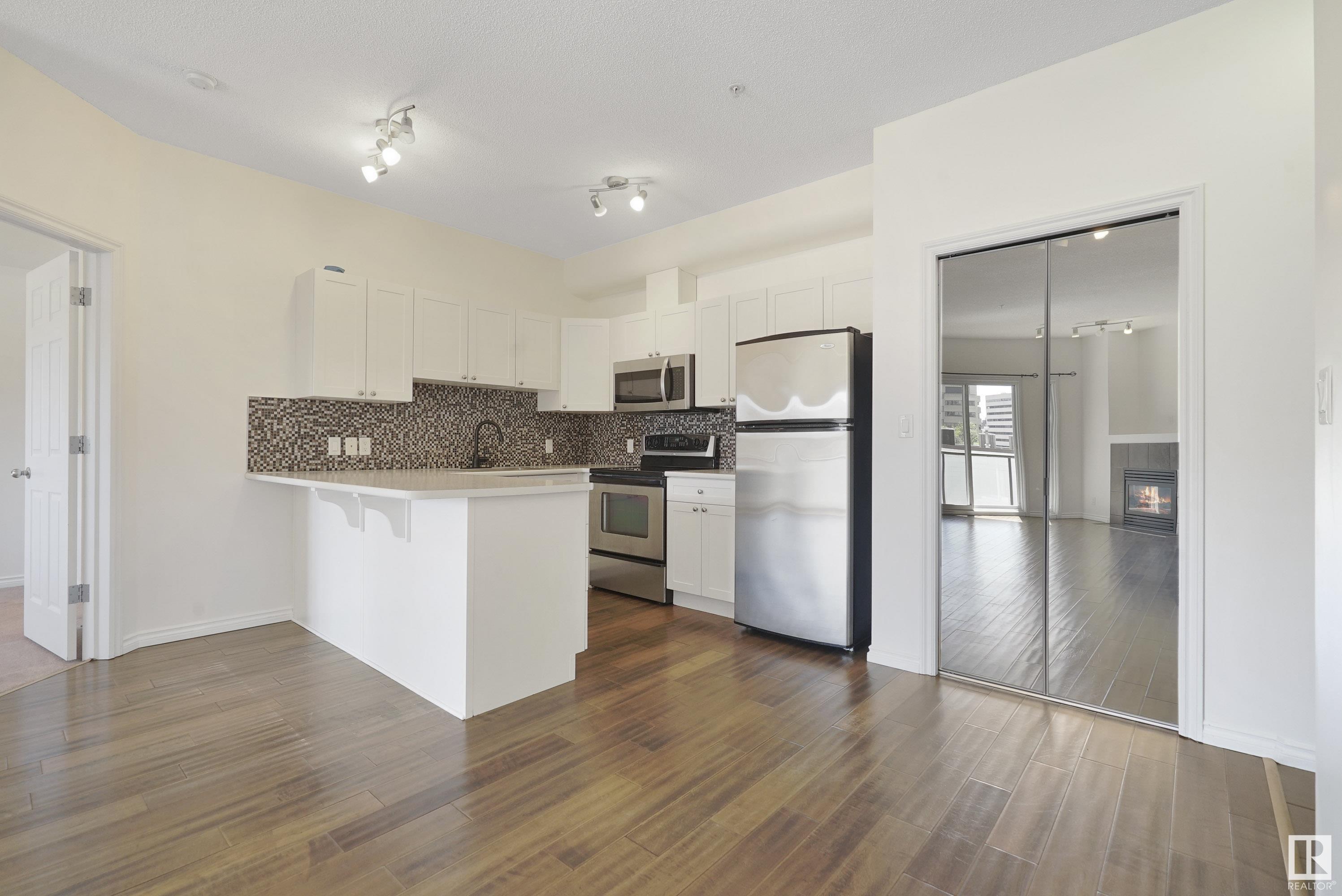 Property Photo:  10235 112 Street NW 414  AB T5K 1M7 