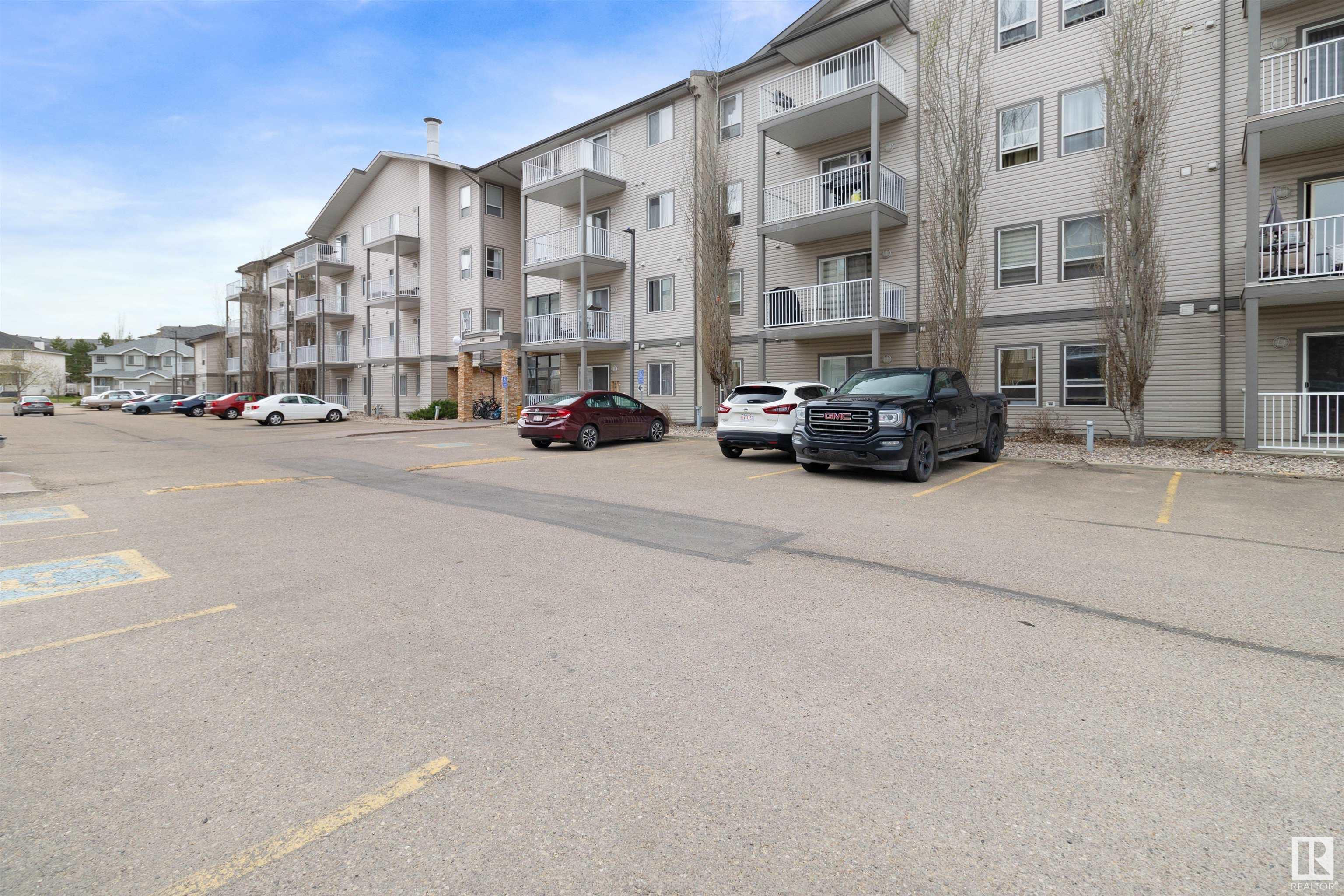 Property Photo:  155 Edwards Drive SW 218  AB T6X 1N6 