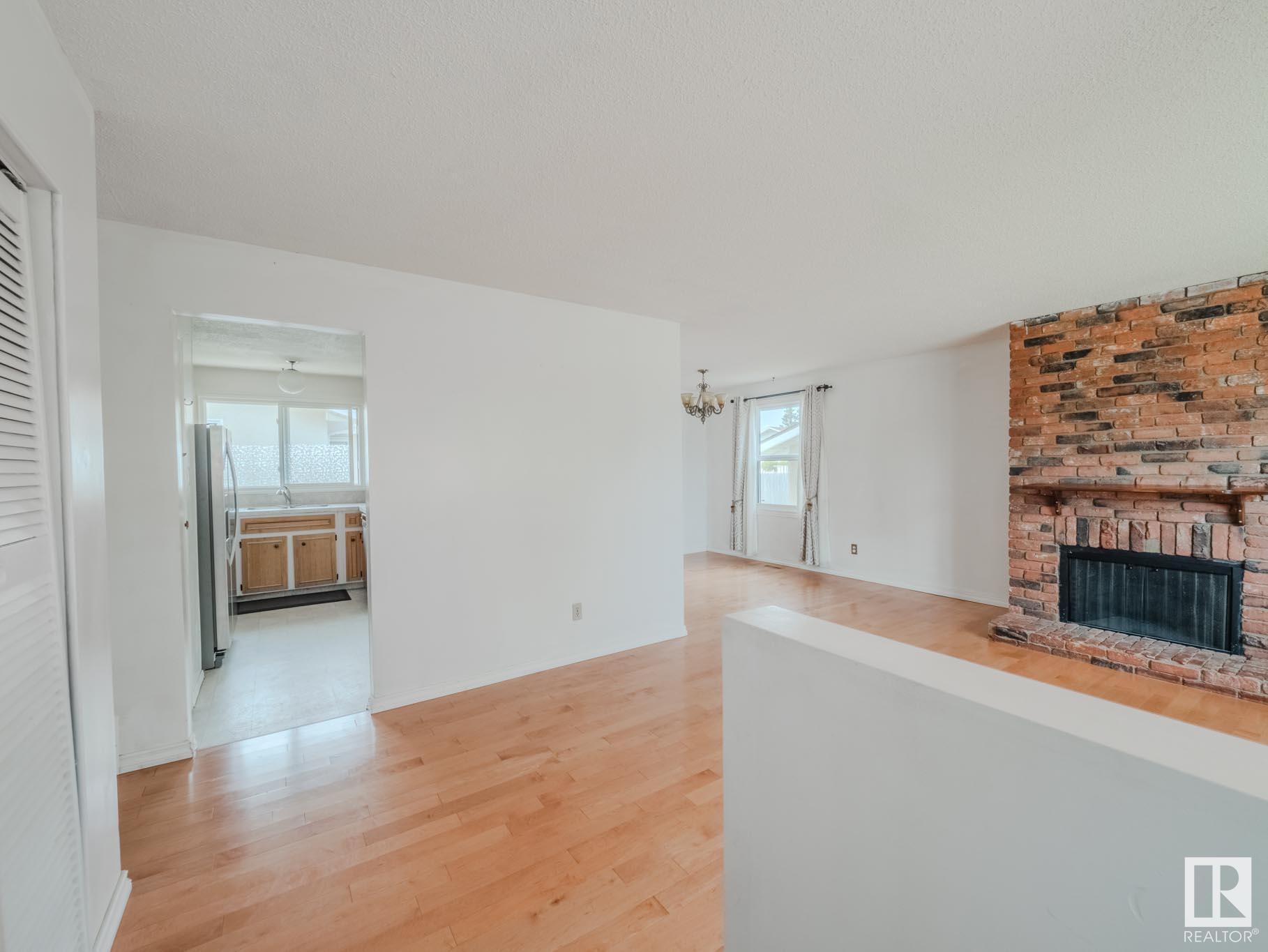 Property Photo:  4705 128A Avenue NW  AB T5A 2J4 