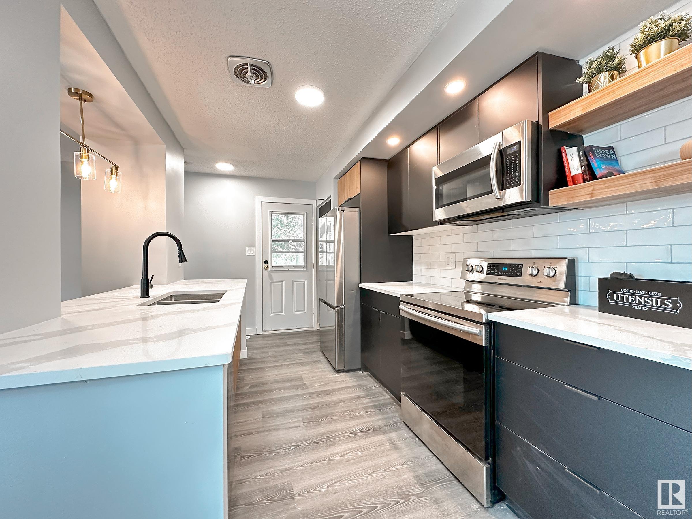Property Photo: 862 Erin Place NW AB T5T 1M6