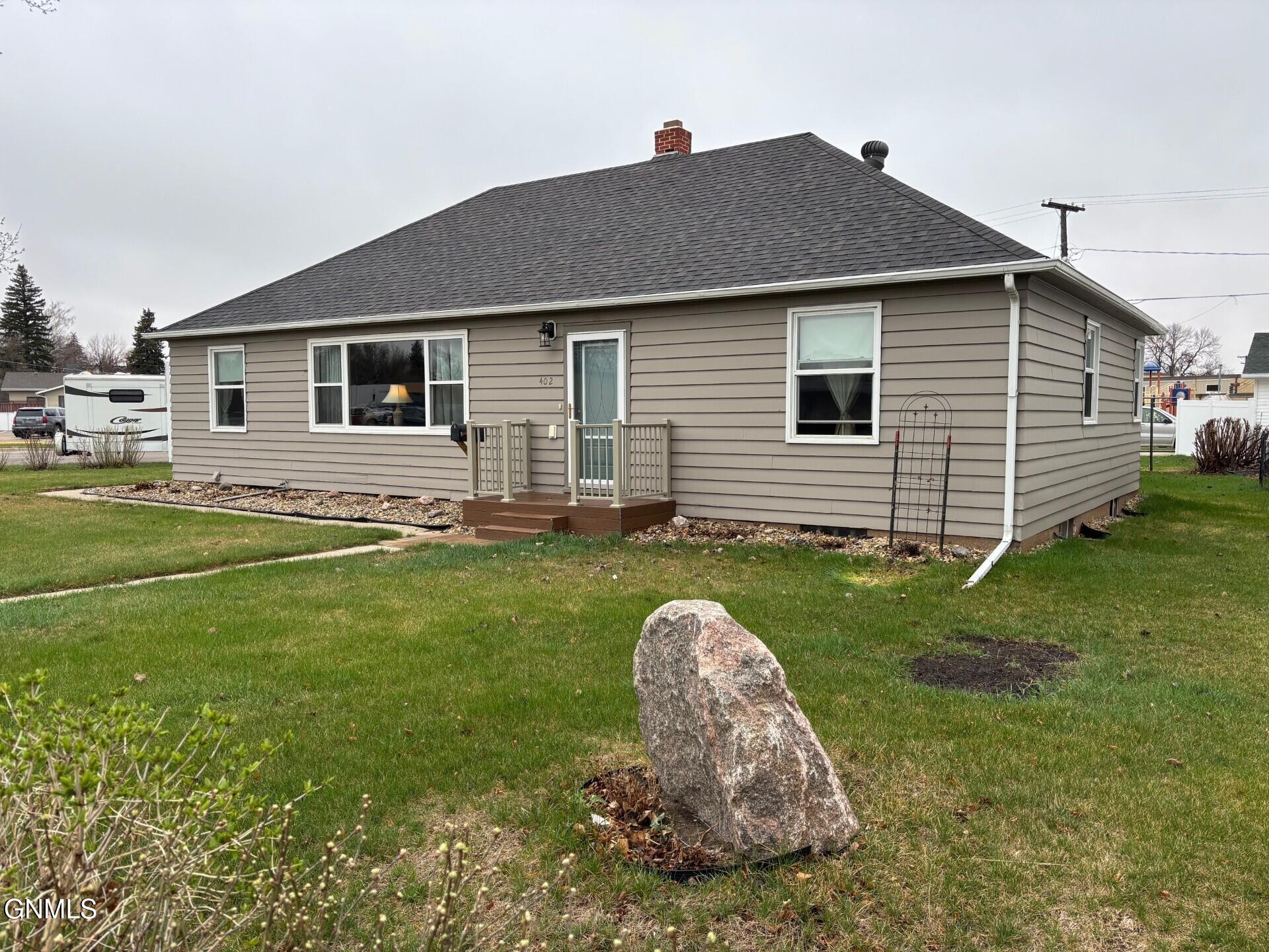 Property Photo:  402 Brewster Street E  ND 58341 