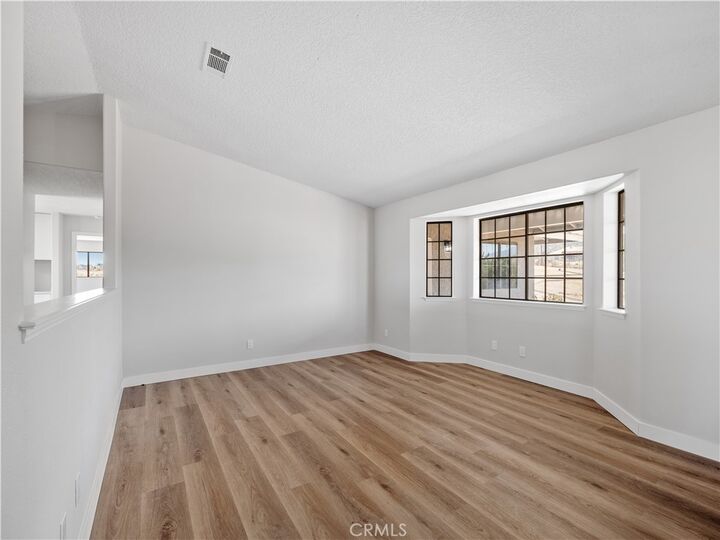 Property Photo:  5620 Ailanthus Street  CA 92371 