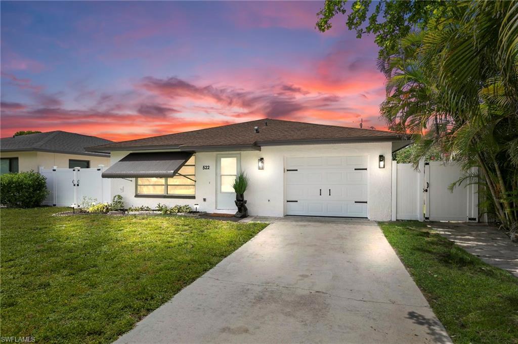 Property Photo: 522 108th Ave N FL 34108