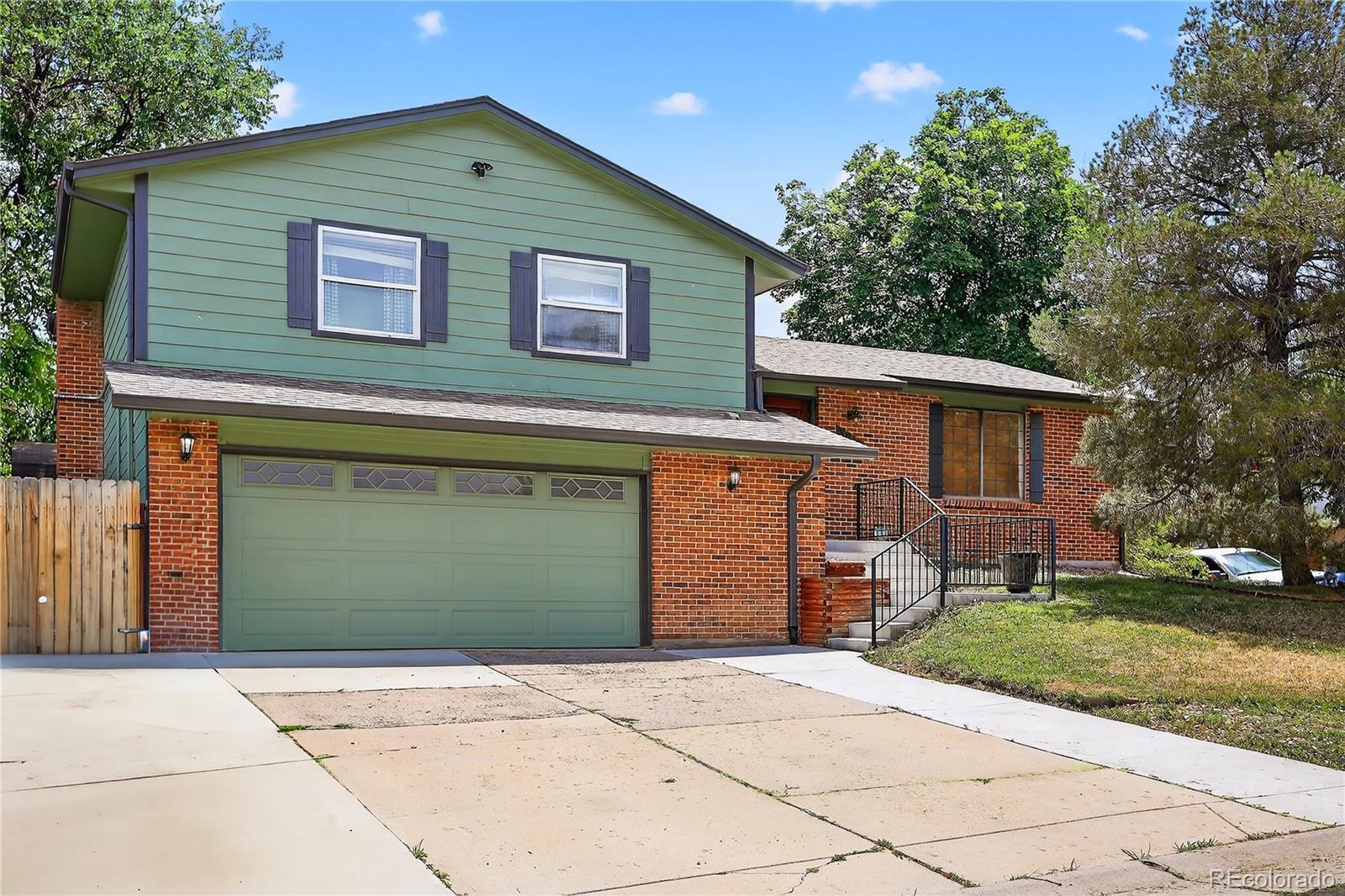 Property Photo: 3258 S Ensenada Way CO 80013