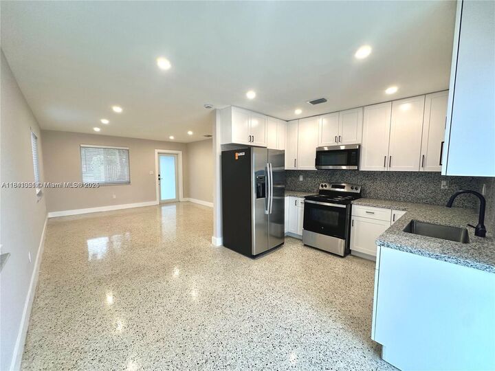Property Photo:  10302 NW 35th Ct  FL 33147 