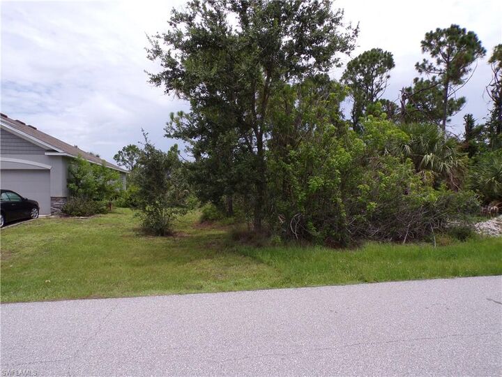 Property Photo:  15126 Amsterdam Ave  FL 33981 