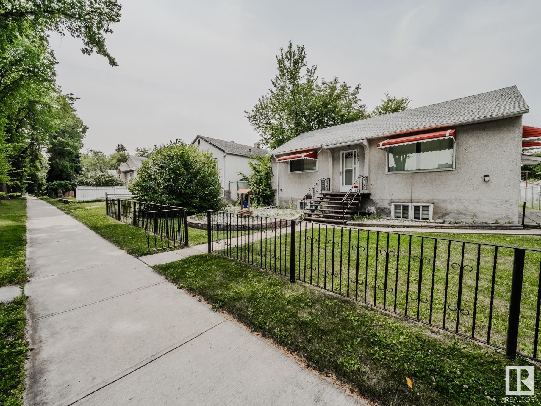 Property Photo:  12048 61 Street NW  AB T5W 4B1 