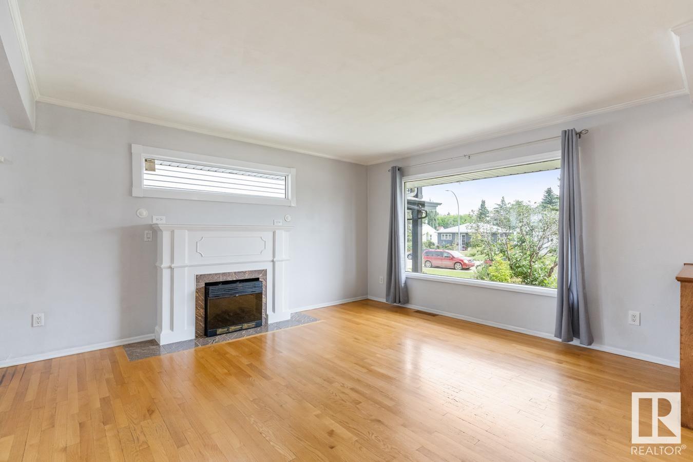 Property Photo:  10926 117 Street NW  AB T5H 3N6 