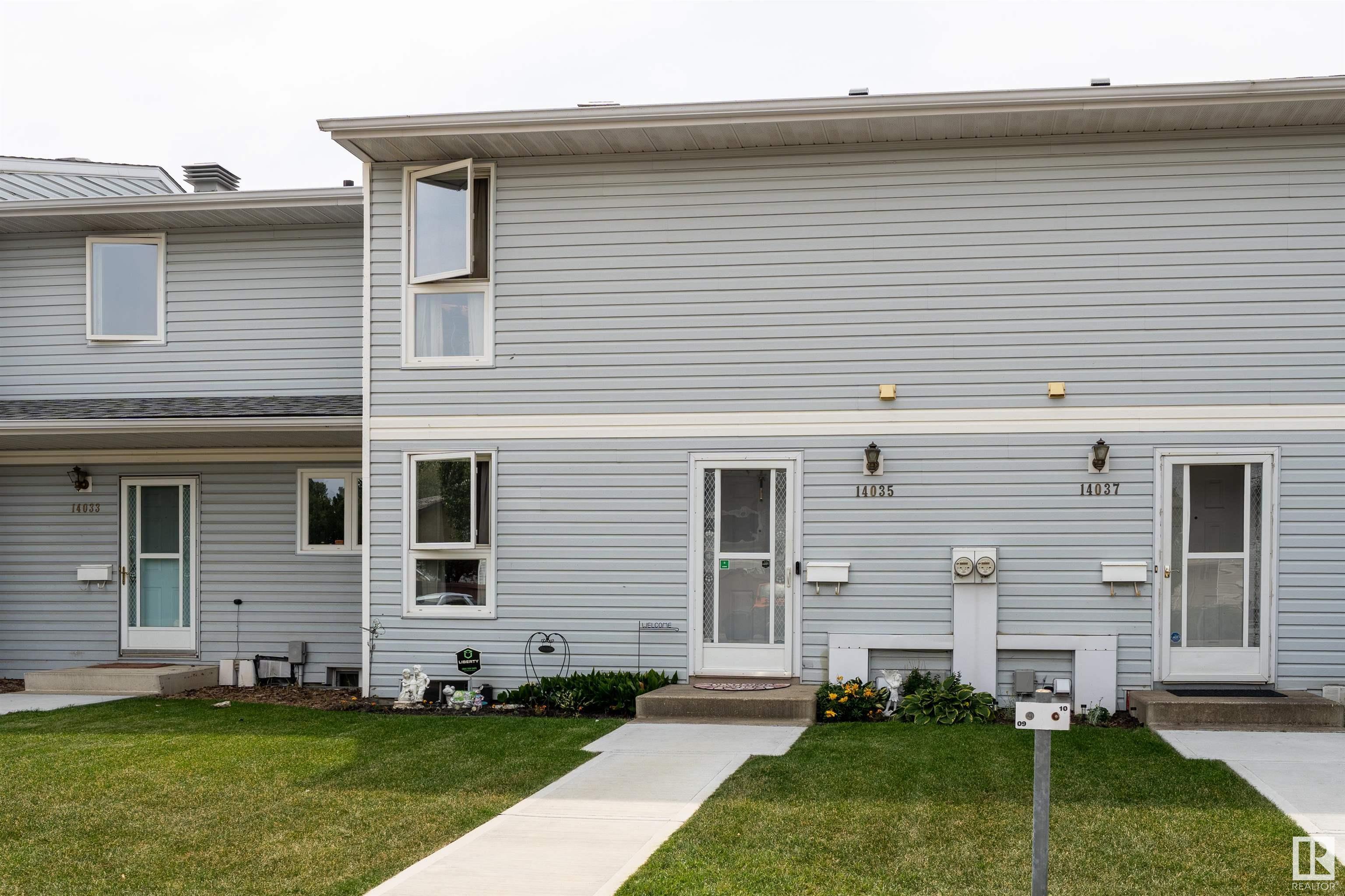 Property Photo:  14035 121 Street NW  AB T5X 4H8 