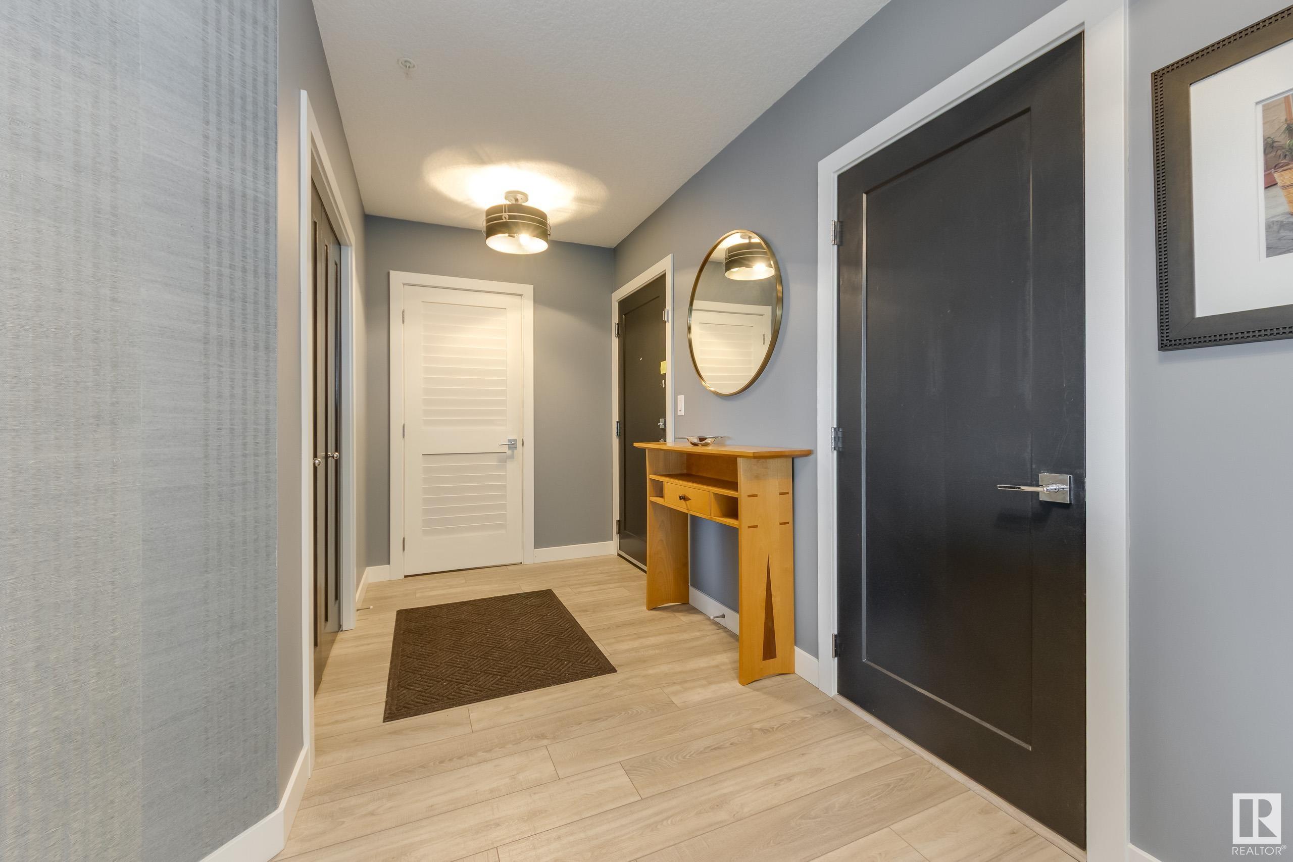 Property Photo: 1316 Windermere Way SW 401 AB T6W 2J3