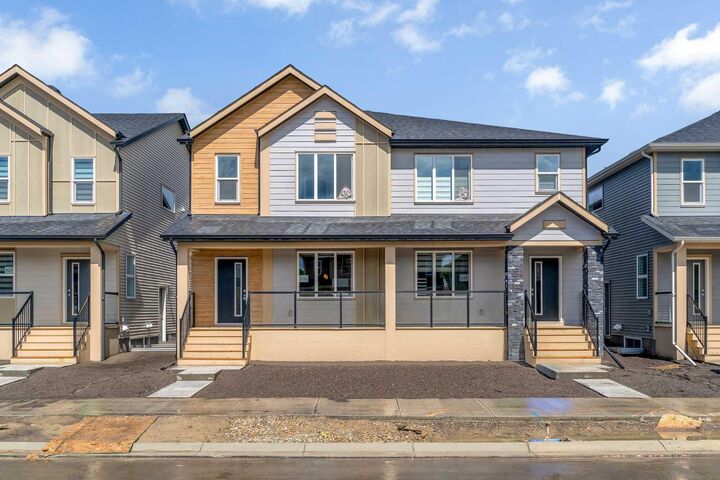 Property Photo:  822, 826, 830, 834 Wolf Willow Boulevard SE  AB T2X 5R5 