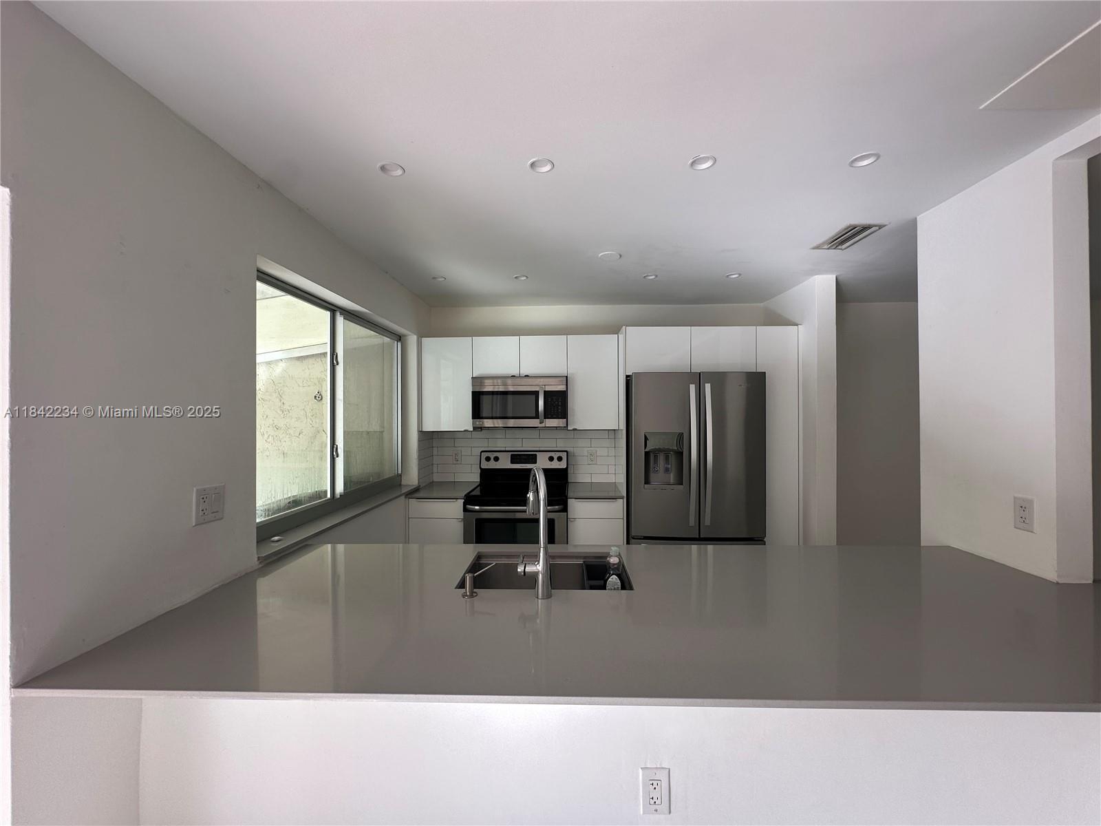 Property Photo:  6910 Holly Rd  FL 33014 