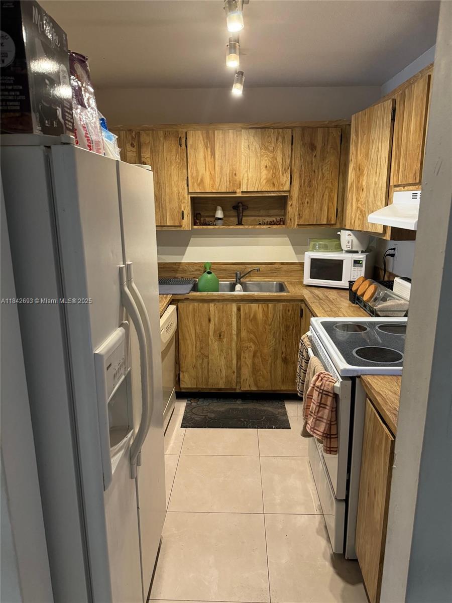 Property Photo:  9301 SW 92nd Ave 204C  FL 33176 