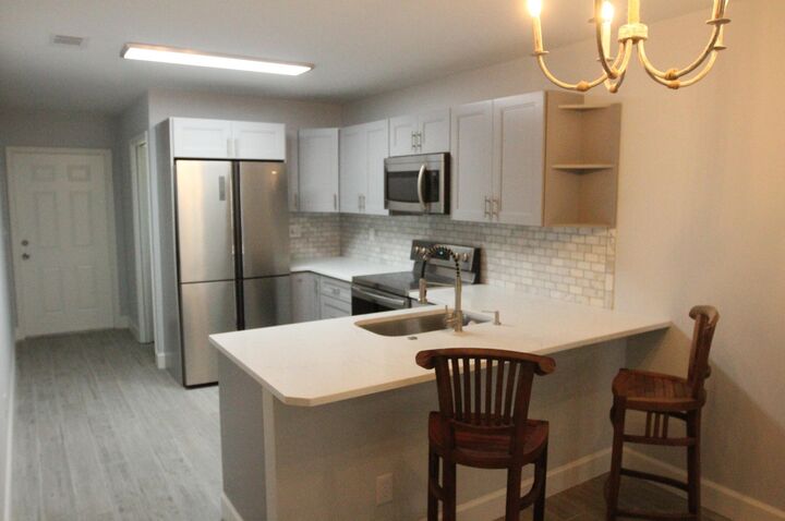 Photo de la propriété: 125 Castlewood Drive 1 FL 33408