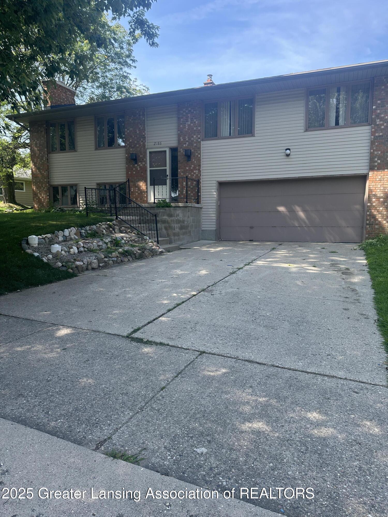 Property Photo: 2186 Tamarack Drive MI 48864