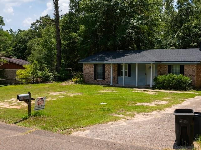 Property Photo: 7011 Jamestown Drive AL 36544