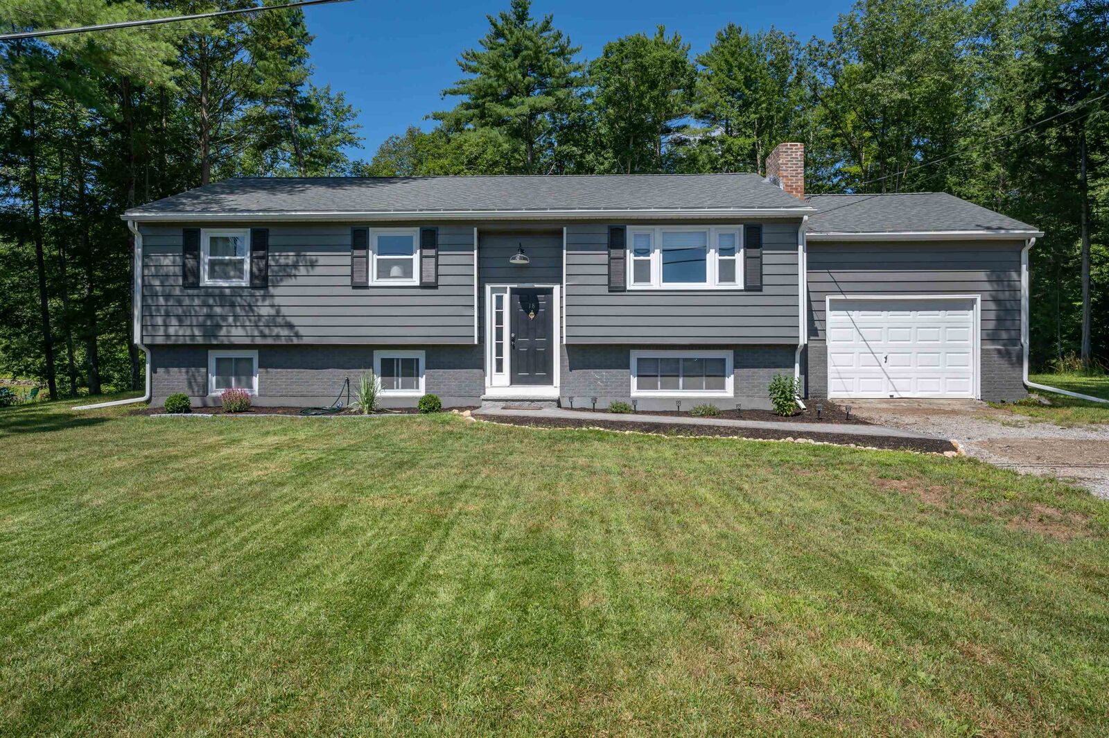 Property Photo:  18 Dream Lake Drive  NH 03031 