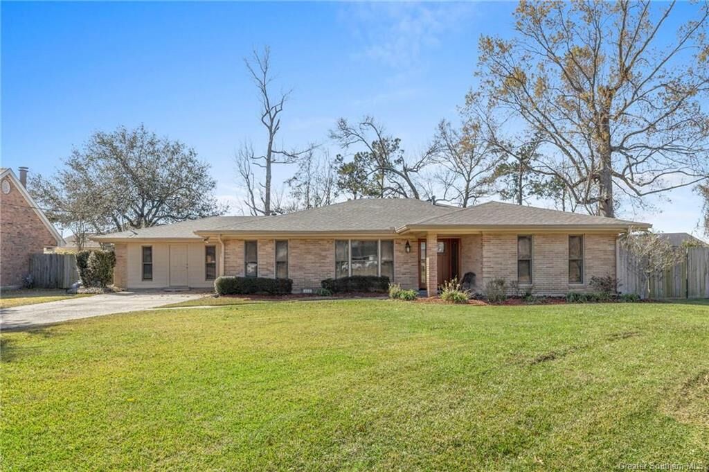 Property Photo: 1619 S Whispering Woods Drive S LA 70605