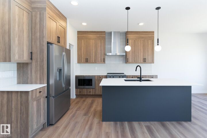 Property Photo: 2504 158 Street SW AB T6W 5P6