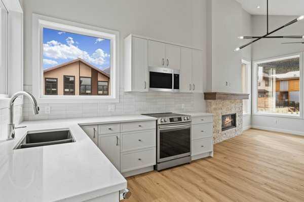 Property Photo: 209 Stewart Creek Rise 203J AB T1W 0N9