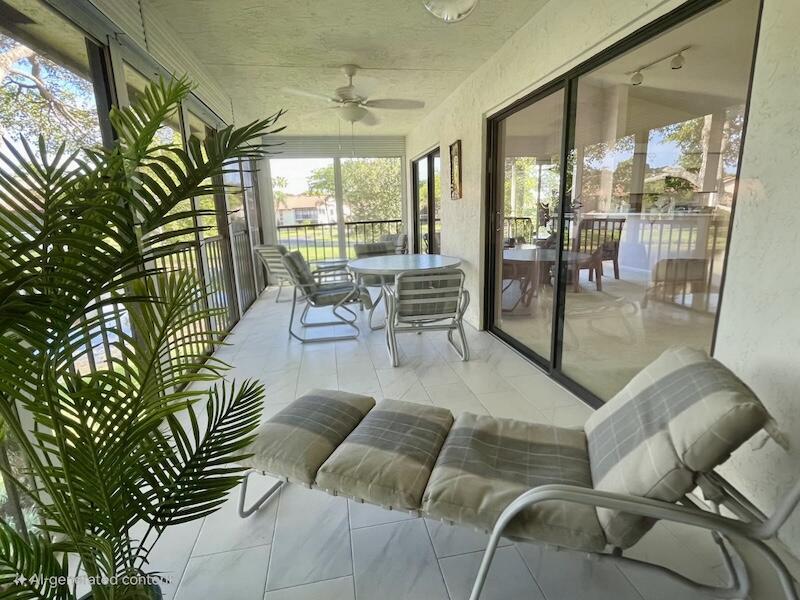 Property Photo:  10656 Tropic Palm Avenue 202  FL 33437 