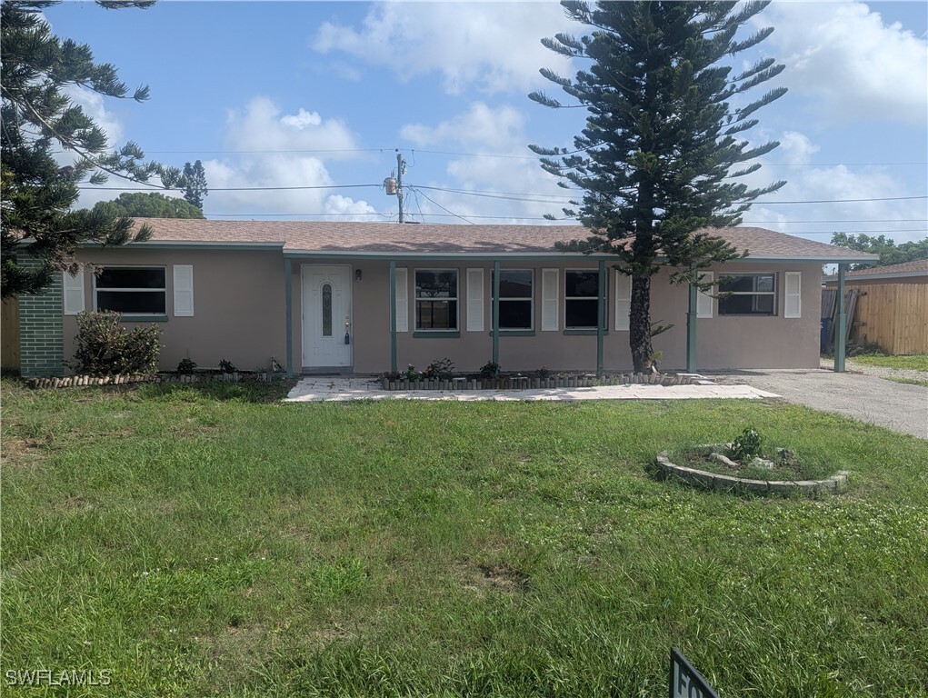 Property Photo: 18165 Iris Road FL 33967