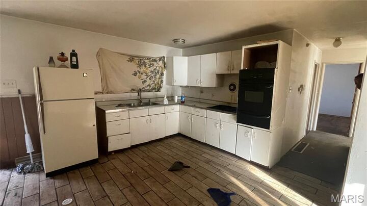 Property Photo:  10401 Baron Drive  MO 63136 