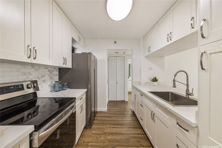 Property Photo:  5070 Likini Street Ph210  HI 96818 