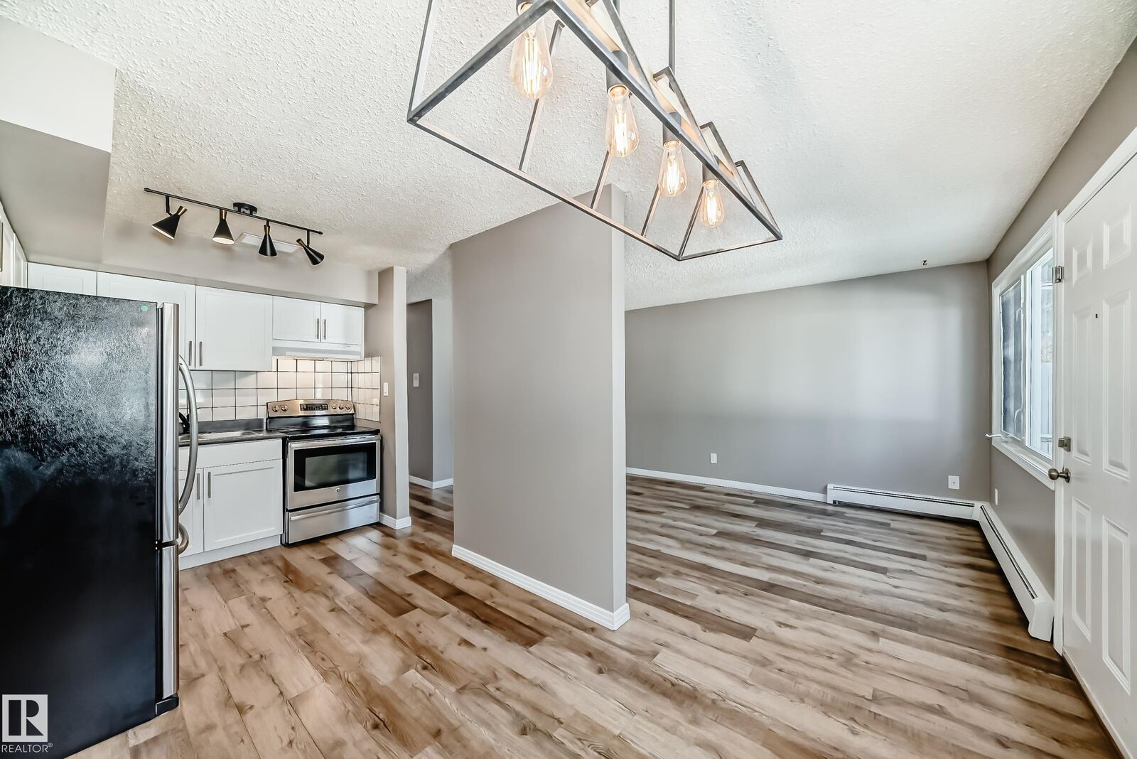 Property Photo:  16340 109 Street NW 112  AB T5X 2T4 