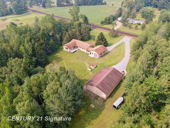 Property Photo:  132 N Nine Mile Road  MI 48640 