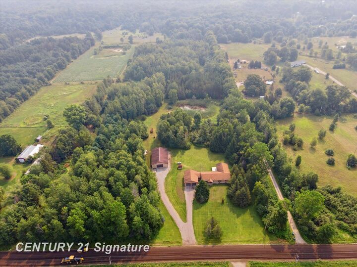 Property Photo:  132 N Nine Mile Road  MI 48640