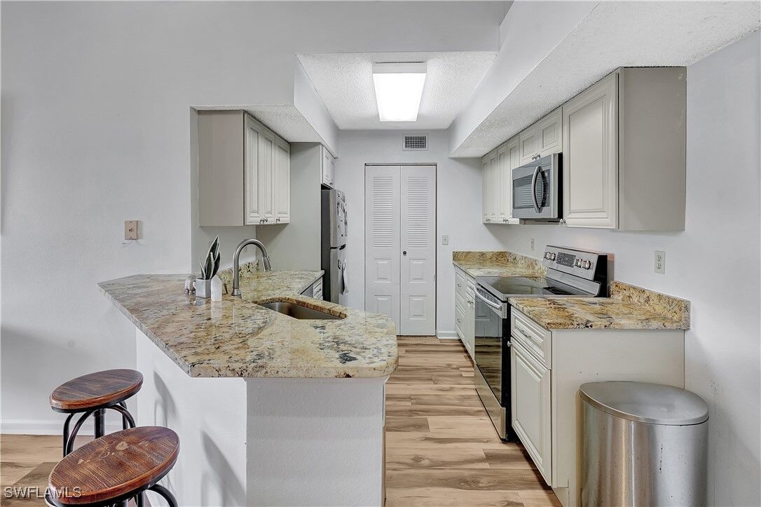 Property Photo: 13615 Eagle Ridge Drive 1633 FL 33912