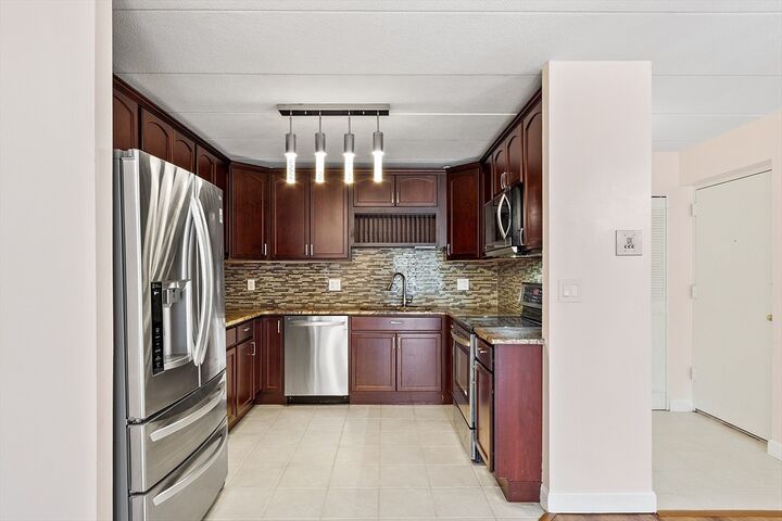 Property Photo: 65 Commons Drive 410 MA 01545