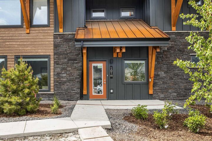 Property Photo:  209 Stewart Creek Rise 101L  AB T1W 0N9 