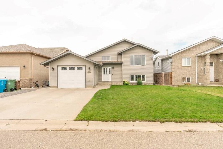 Property Photo: 4206 56 Street AB T1G 2J2