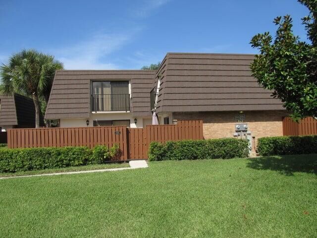 Property Photo: 1505 15th Court 75-A FL 33477