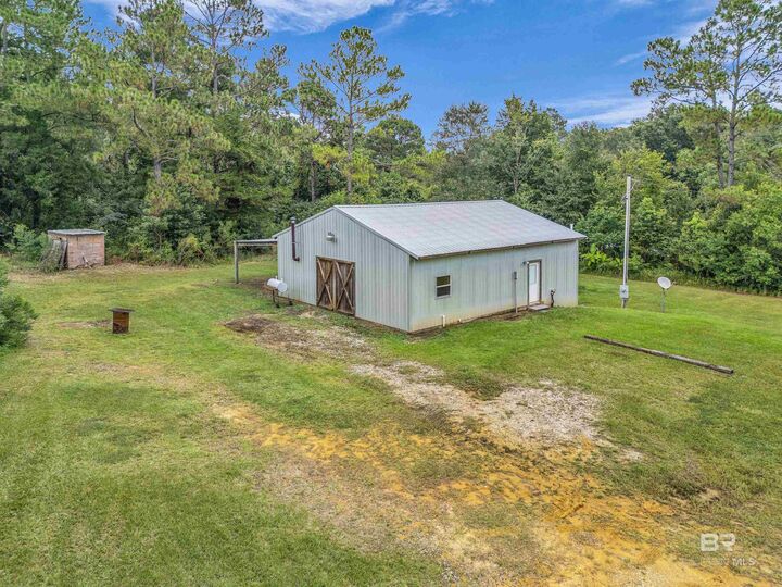 Property Photo:  22131 County Road 64  AL 36567 