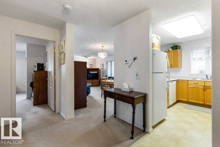 Property Photo:  160 Kingswood Boulevard 106  AB T8N 6V4 