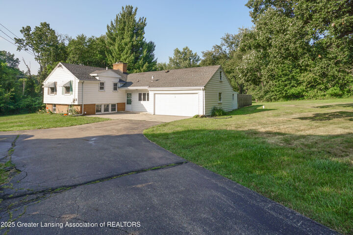 Property Photo:  35 W Sherwood Road  MI 48864 