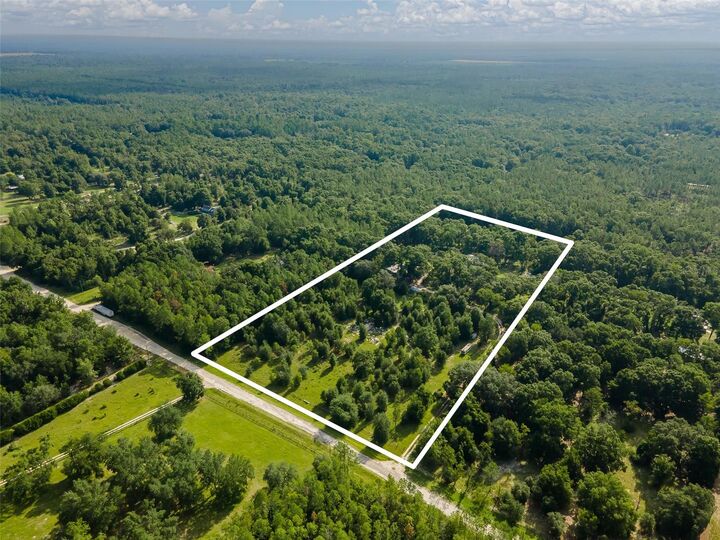 Property Photo:  3380 NE 44th Avenue  FL 32643 
